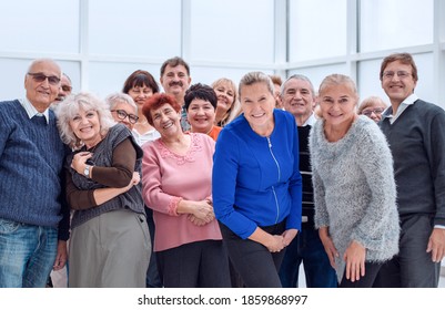 Group Of Happy Seniors Look At Camera