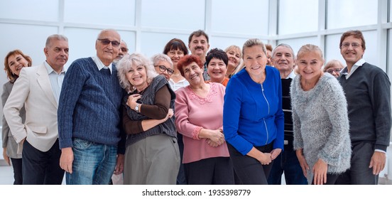 group of happy seniors look at camera - Powered by Shutterstock