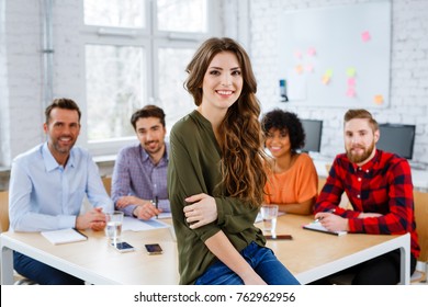 Group Of Happy Students In Classroom