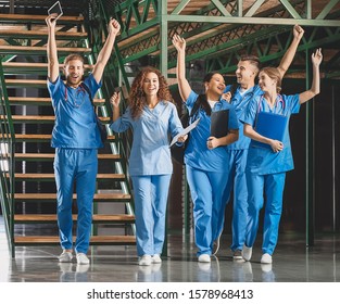 Group Of Happy Students In Corridor Of Medical University