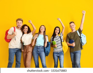 Group Of Happy Students On Color Background