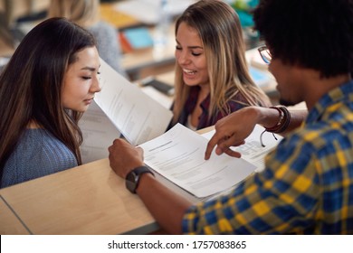 Group Of Happy Students Passed Exam Comparing Results