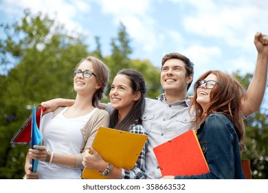 Group Of Happy Students Showing Triumph Gesture