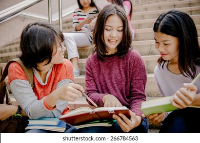 Group Of Happy Teen High School Students Outdoors