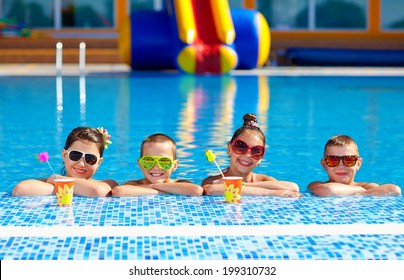 group of happy teenage kids in the pool