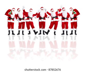 Group Of Happy Traditional Santa Claus. Christmas. Isolated On White Background.