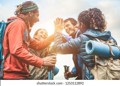 Group Of Happy Trekkers Stacking Hands Outdoor - Young Hiker Friends Supporting Each Others - Survival, Team, Travel, Success And Adventure Concept - Focus On Hands