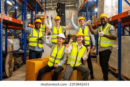 Group of happy warehouse workers celebrating success in warehouse - Powered by Shutterstock