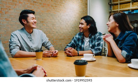 Group of happy young Asia friends having fun a great time and laughing enjoying meal while sitting together at cafe restaurant. Coffee shop holiday activity, modern friendship lifestyle concept. - Powered by Shutterstock