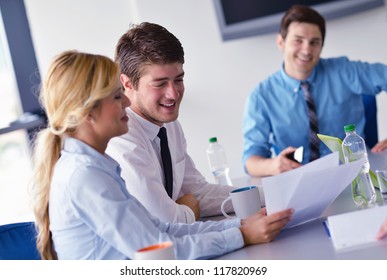 Group Of Happy Young  Business People In A Meeting At Office