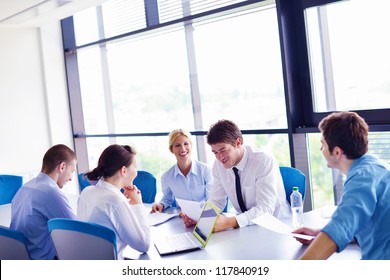 Group Of Happy Young  Business People In A Meeting At Office