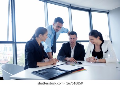 Group Of Happy Young  Business People In A Meeting At Office