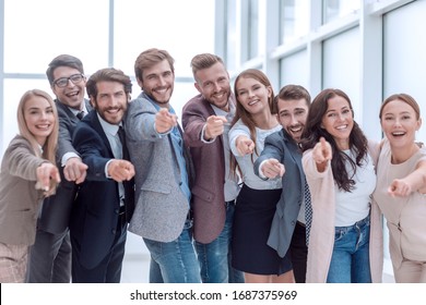 Group Of Happy Young Business People Pointing At You