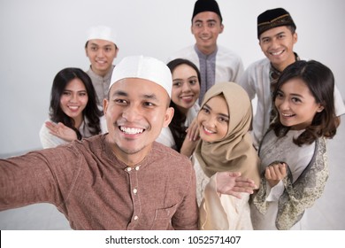 Group Of Happy Young Muslim Take A Selfie Together