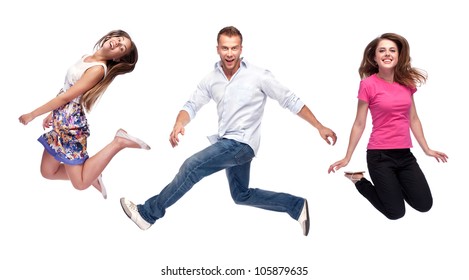 Group Of Happy Young People Jumping - Isolated Over A White Background