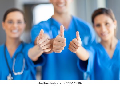 Group Of Healthcare Workers Thumbs Up