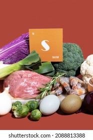 A Group Of Healthy Foods Rich In Sulfur. Healthy Diet Food. Cardboard Sign With The Inscription.