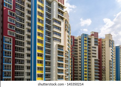 A Group Of High Rise Colorful Residential Apartments.