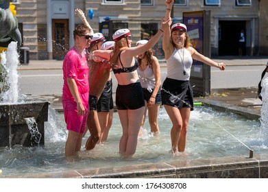 Group Of High School Students In A Fountain Celebrating Graduating From High School In Aarhus, Denmark On 25 June 2020