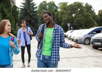 Group Of High School Students Talking And Laughing