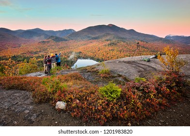 Group of hikers overlooking Heart Lake in the Adirondacks