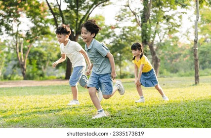 group image of asian children having fun in the park - Powered by Shutterstock