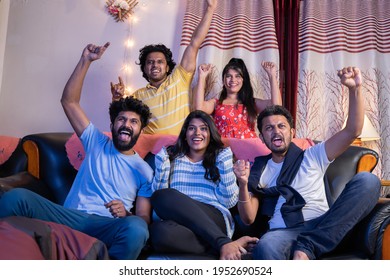 Group Of Indian Cricket Fans Shouting And Cheering Up To Support The Team While Watching Sports On Tv At Home