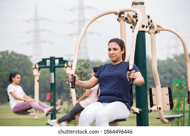 Group Of Indian Women Doing Workout At Public Park In The Morning