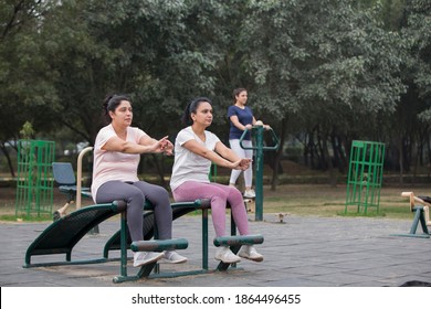 Group Of Indian Women Doing Workout At Public Park In The Morning