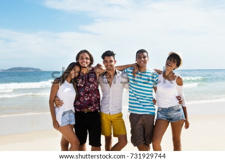 Group of international friends at beach
