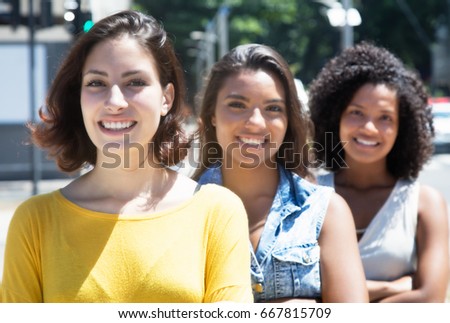 Group of international woman in line