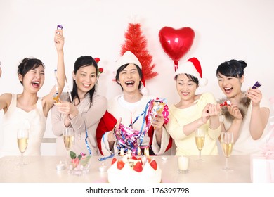 Group Of Japanese At A Christmas Party