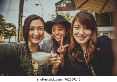 Group Of Japanese Friends Spending Time In Tokyo And Having Fun