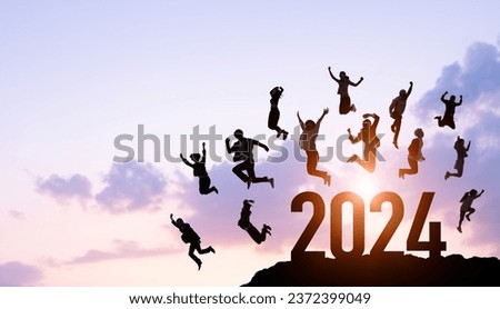 Group of jumping multinational people. 2024 New Year concept. New year's card 2024. Wide angle visual for banners or advertisements.