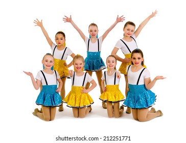 A Group Of Junior Jazz Dancers In Recital Costume