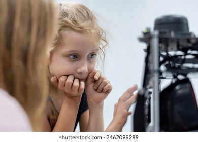 Group Kid teen child enjoy Machine Learning Robot arm is Moving Under coding Control robot at stem technology class, stem education for digital automation learn for use artificial intelligence ai