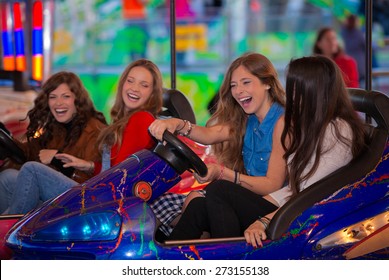 Group Of Kids Or Girls Having Fun At Fair. 