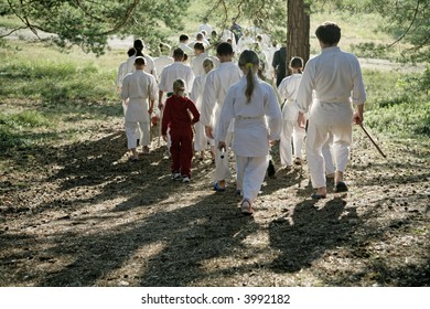 Group Of Kids Going To Martial Arts Training