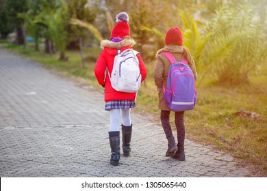 Group Of Kids Going To School Together, Back To School, Winter Time.