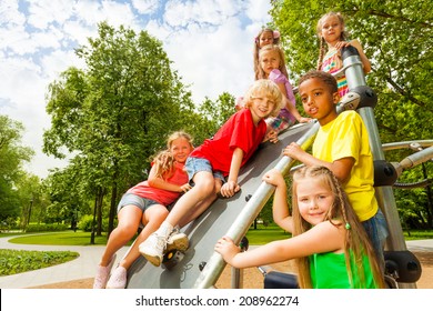 Group Of Kids On Playground Construction Together