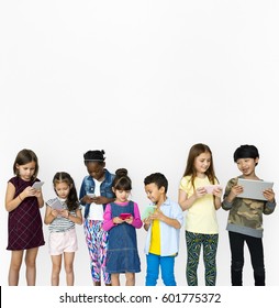 Group Of Kids Using Digital Devices Connect Technology