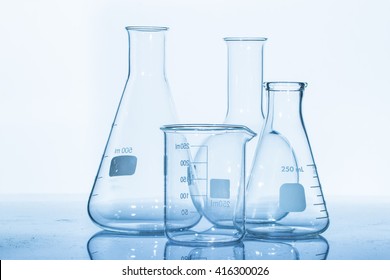 Group of laboratory flasks empty or filled 