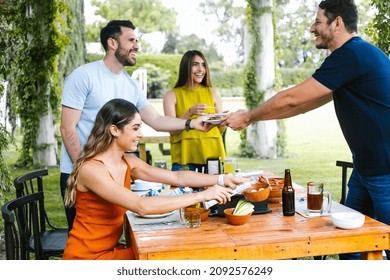 Group Of Latin Friends Eating Mexican Food In The Restaurant Terrace In Mexico Latin America