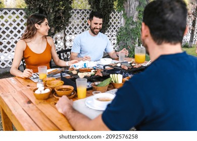 Group Of Latin Friends Eating Mexican Food In The Restaurant Terrace In Mexico Latin America