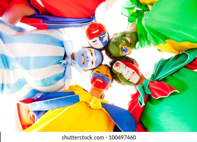 Group Of Latin People With Flags Painted On Their Face