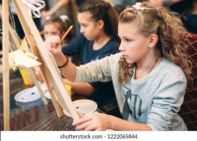 Group Lesson In Drawing. Children Learn To Draw In The Classroom.