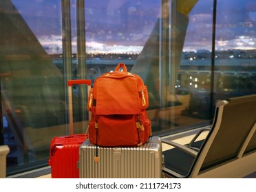 Group of the luggage and baggage traveling luggage in the airport terminal at the night with bokeh background