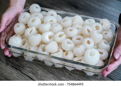 Group Of Lychee And Peeled In Glass Tupperware