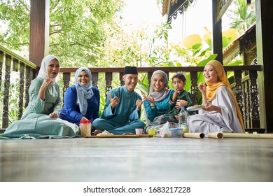 Group Of Malay Family Breaking The Fast Together