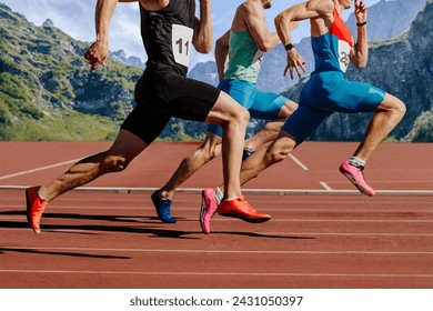 group male athletes running on red track stadium on background mountains and sky. muscles taut, competing fiercely - Powered by Shutterstock